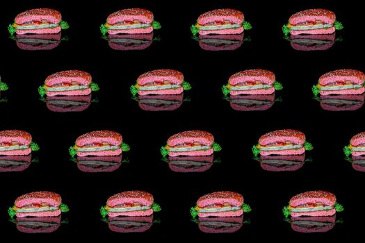 colorful pattern of a red hamburger on a black background top view. High quality photo