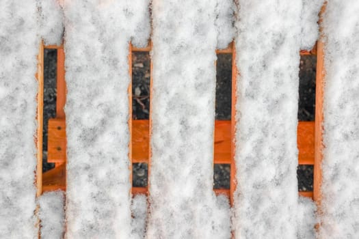 planks benches covered with snow. High quality photo