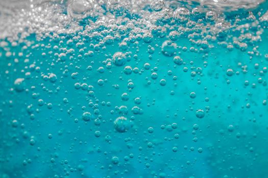 air bubbles in blue shampoos as background. High quality photo