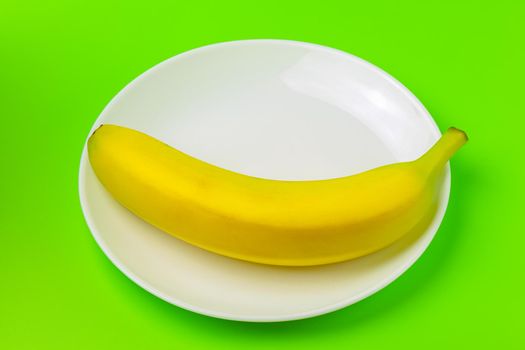 banana on a green background close-up.isolate. High quality photo