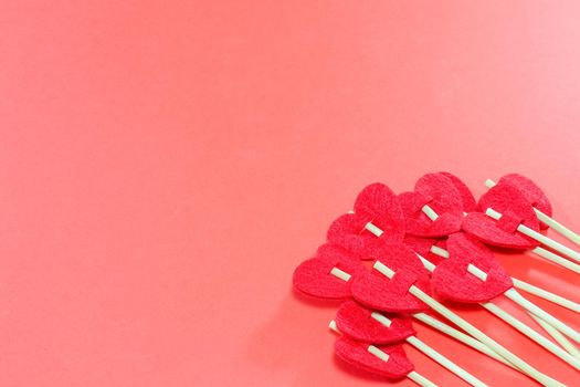 red hearts on a red background for Valentine's day. High quality photo