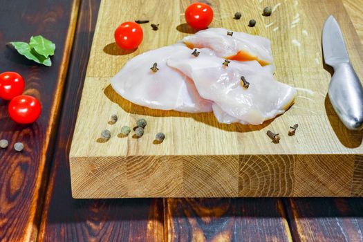 chicken fillet on a cutting Board top view. High quality photo