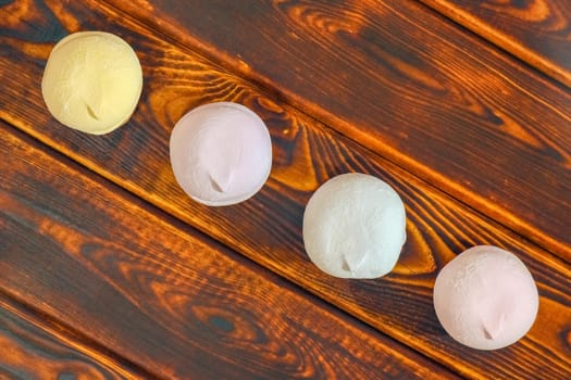 multicolored marshmallow on a wooden background macro. High quality photo