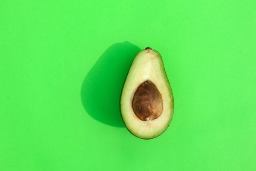 avocado color on a solid background, the top view pattern. High quality photo