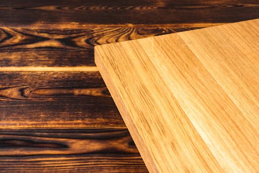 cutting Board on a wooden background top view. High quality photo