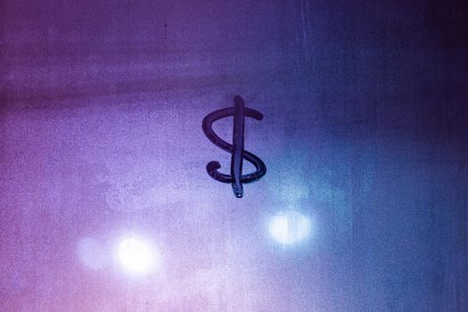 Dollar currency sign handwritten on fogged window. Dollar symbol on wet night window glass surface.