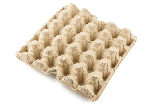 empty formed cardboard egg tray - closeup with edge-to-edge sharpness, isolated on white background in diagonal orientation