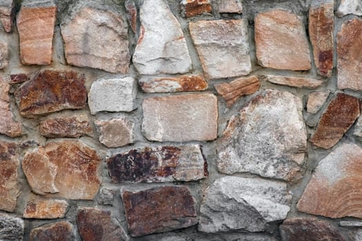 masonry wall paving stones as a background close up. High quality photo