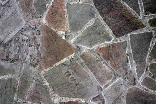 masonry wall paving stones as a background close up. High quality photo