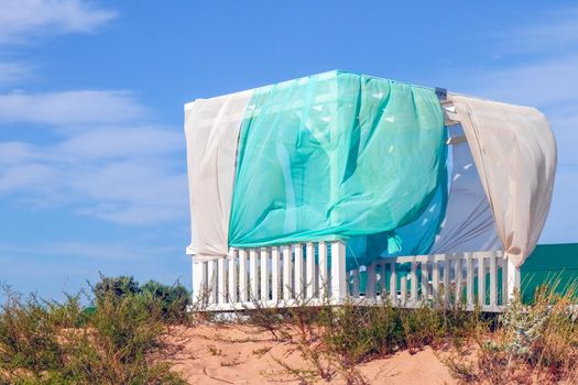 gazebo for relaxing on the dune sand with a place for writing. High quality photo