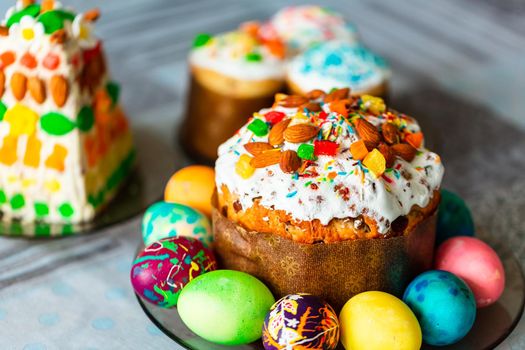 Traditional Easter holiday table served with homemade Easter cake and painted eggs