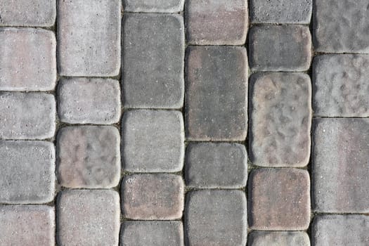 masonry wall paving stones as a background close up. High quality photo