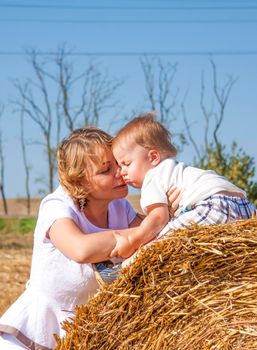 Live emotions of mother and son. A small child and a woman experience the feelings of love of mother and son.Family.