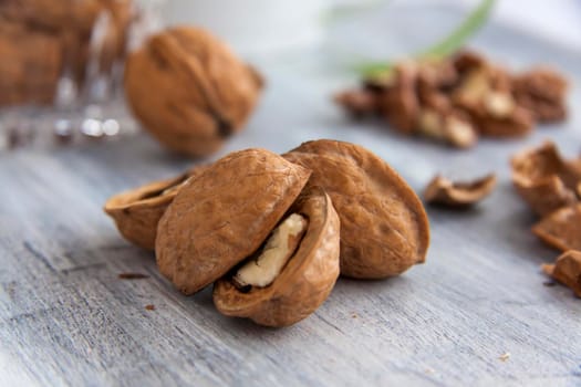 Walnuts in a shell in a crystal vase. Healthy nuts. Walnuts.