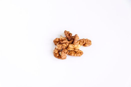 Walnuts without shells on a white background. Healthy nuts. Walnuts.