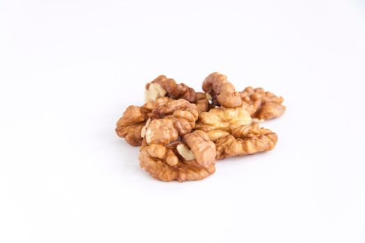 Walnuts without shells on a white background. Healthy nuts. Walnuts.