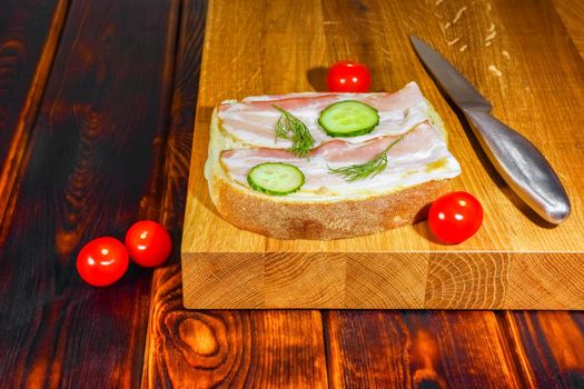 sandwich on the cutting Board as background. High quality photo