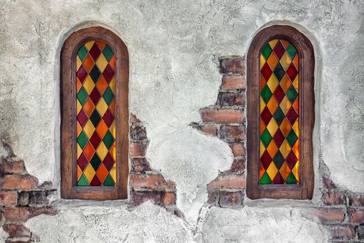 Windows with multicolored glass as a close-up background . High quality photo
