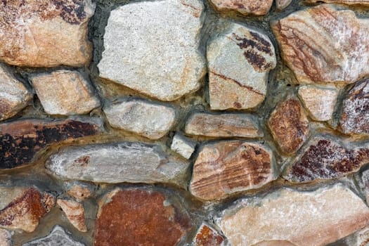 masonry wall paving stones as a background close up. High quality photo