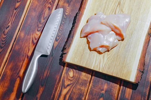 chicken fillet on a cutting Board top view. High quality photo