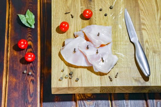 chicken fillet on a cutting Board top view. High quality photo