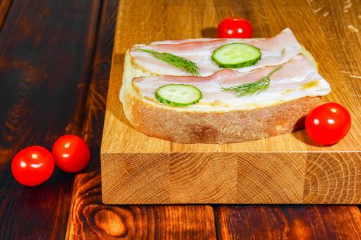 sandwich on the cutting Board as background. High quality photo