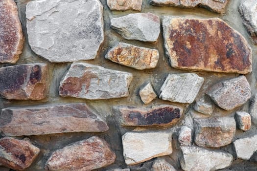 masonry wall paving stones as a background close up. High quality photo