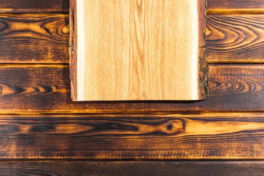 cutting Board on a wooden background top view. High quality photo