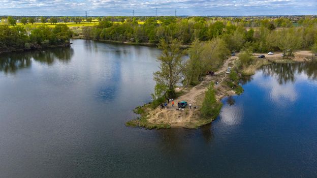 Aerial drone view to Small peninsula with trees and bushes on big Bajkal lake 