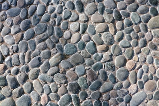 masonry wall paving stones as a background close up. High quality photo