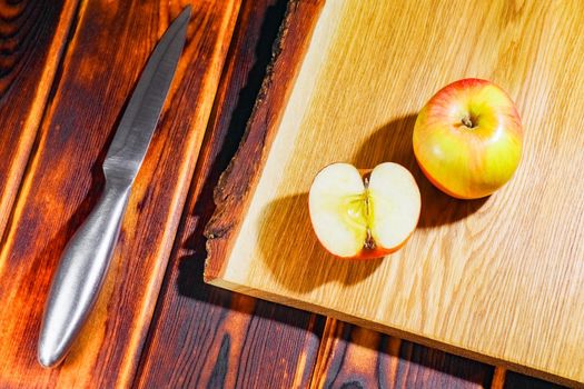 Apple on the chopping Board as background. High quality photo