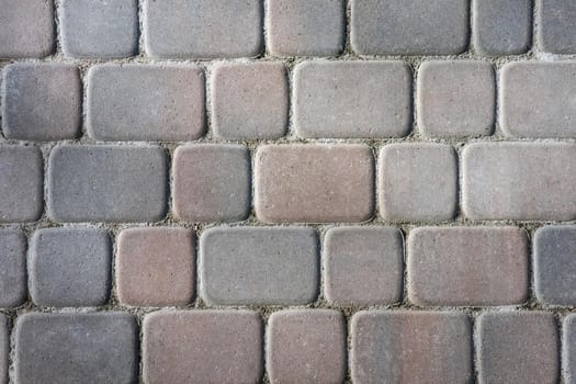 masonry wall paving stones as a background close up. High quality photo