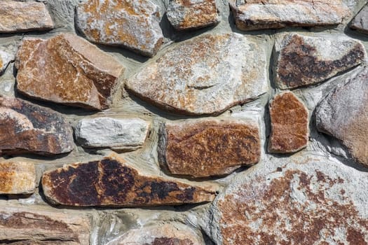 masonry wall paving stones as a background close up. High quality photo