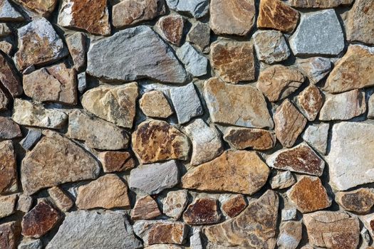 masonry wall paving stones as a background close up