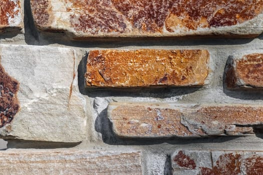 masonry wall paving stones as a background close up. High quality photo