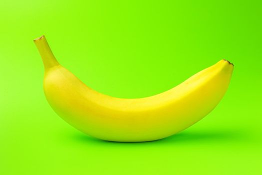 banana on a green background close-up.isolate. High quality photo