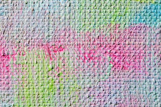brush strokes of colorful oil paints on canvas as a backdrop macro. High quality photo