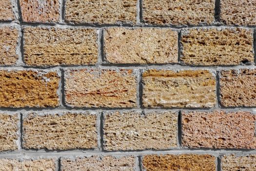 masonry wall paving stones as a background close up