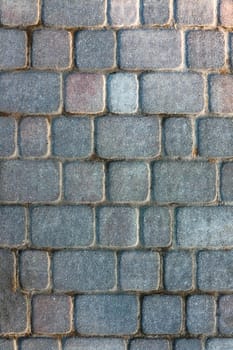 masonry wall paving stones as a background close up. High quality photo