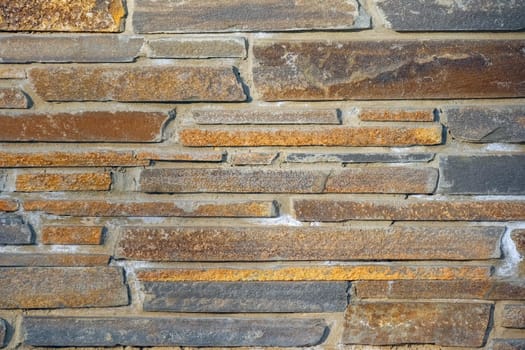 masonry wall paving stones as a background close up. High quality photo