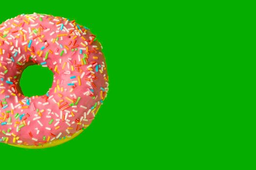 donut donuts on a green background close-up. isolate. High quality photo