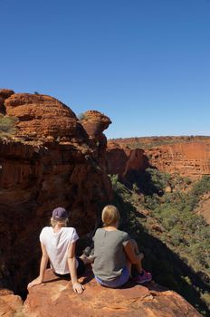 KINGS CANYON, AUSTRALIA May 5, 2015: young womens enyoing view of the Kings Canyon, Watarrka National Park