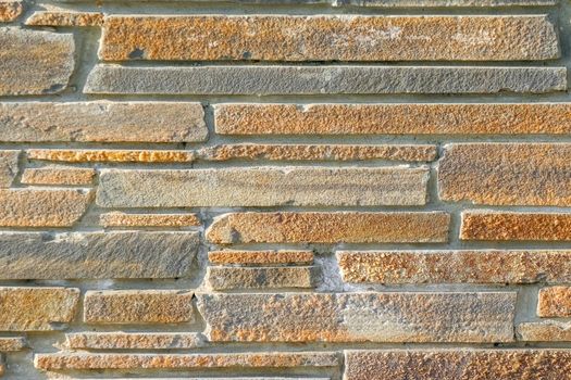 masonry wall paving stones as a background close up. High quality photo