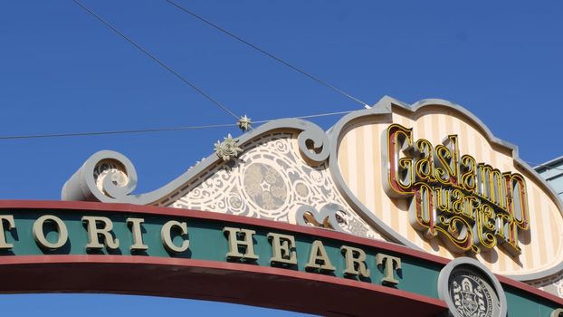 SAN DIEGO, CALIFORNIA USA - 13 FEB 2020: Gaslamp Quarter historic entrance arch sign. Retro signboard on 5th ave. Iconic vintage signage, old-fashioned tourist landmark, city symbol and sightseeing.