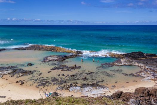 beautiful natural pools with the name Champagne Pools, because of the sparkling waves in the pools, Fraser Island Australia.