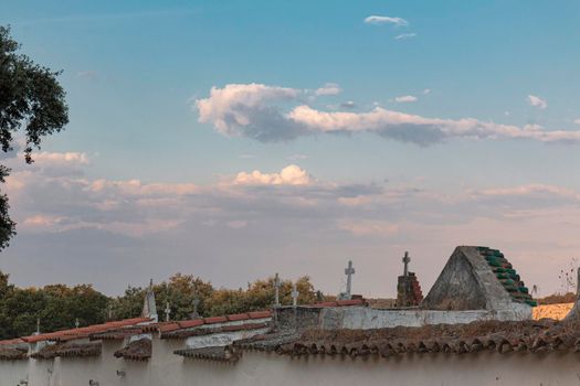 Beautiful couples, fields and landscapes of the Cordoba mountains in Spain. Photograph taken in the month of July.Graveyard in the field