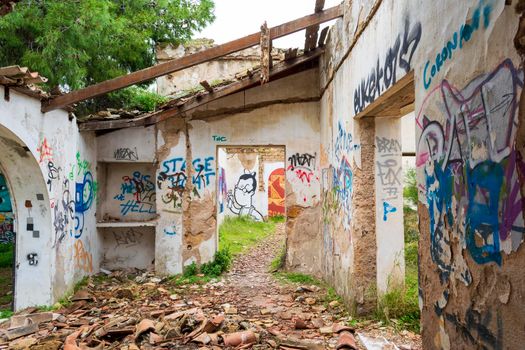 Villa Levidi, Pallini, Greece - February 14, 2021: Wall painting at an abandoned old villa at Pallini, Greece