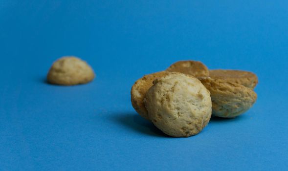 Closeup round butter biscuits. Cookies on a colored background. Dessert, sweetness, lunch.