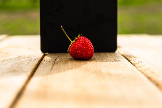 Close up of fresh strawberry showing seeds achenes. Details of a fresh ripe red strawberry.