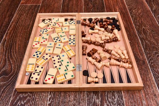 checkers, chess, dominoes and backgammon. set of board games